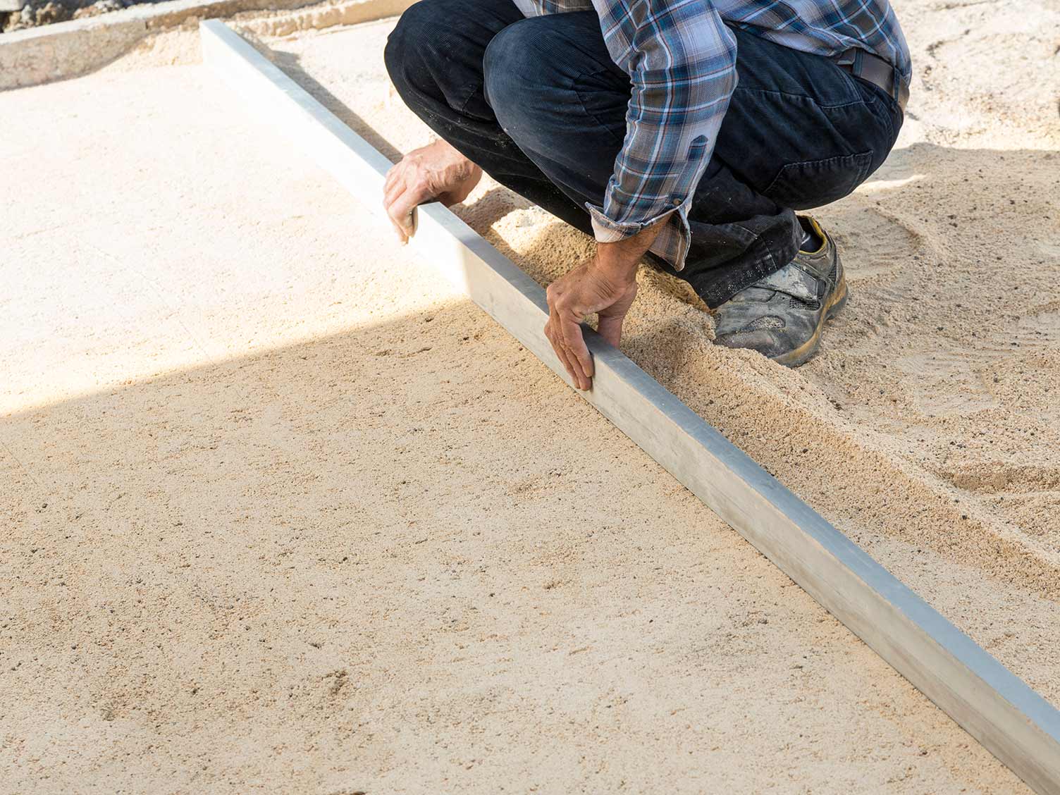 best way to lay slabs on sand
