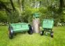 Miracle-Gro lawn spreader range displayed on a lawn.